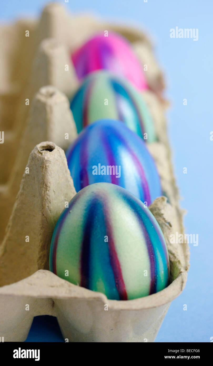 Coloured eggs, Easter eggs, in an egg carton Stock Photo Alamy