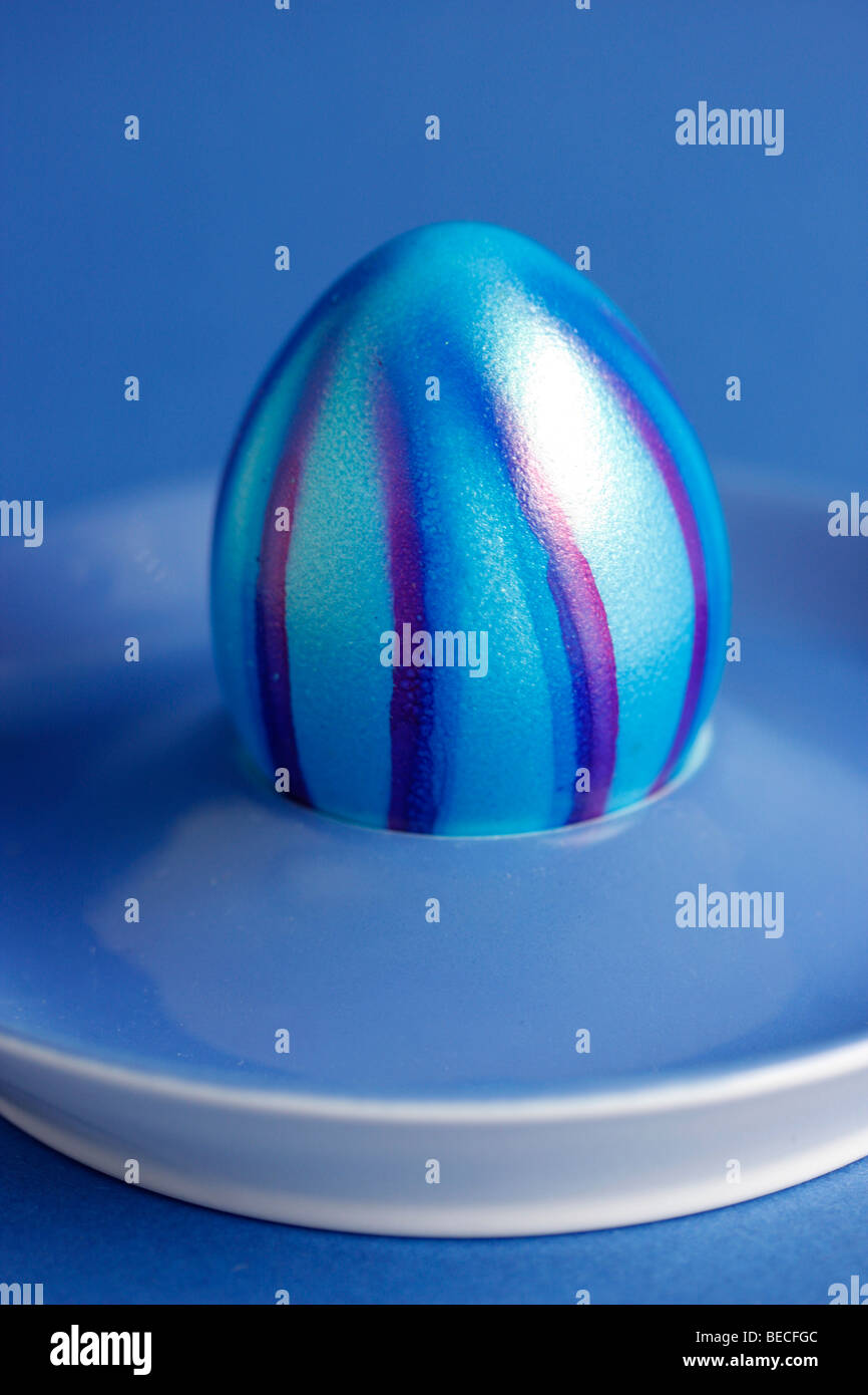 Coloured egg, Easter egg, in an egg cup Stock Photo
