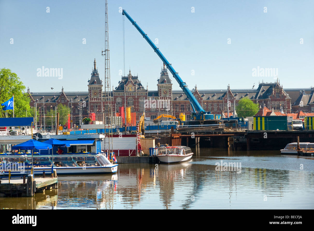 Amsterdam, Canal and train station. The Netherland. Stock Photo