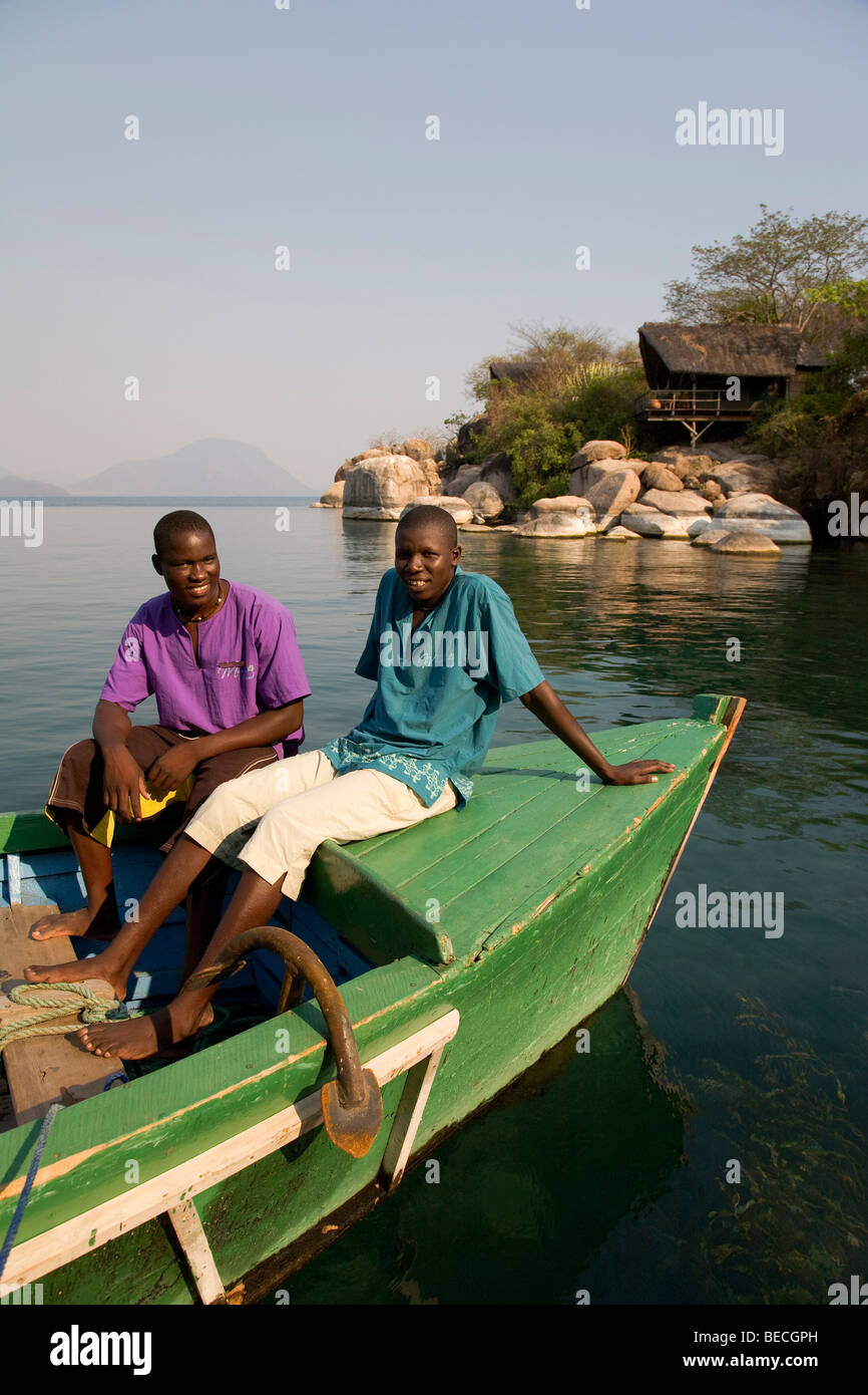 Staff on a boat, Mumbo Island Camp, Cape Maclear Peninsula, Lake Malawi, Malawi, South East Africa Stock Photo