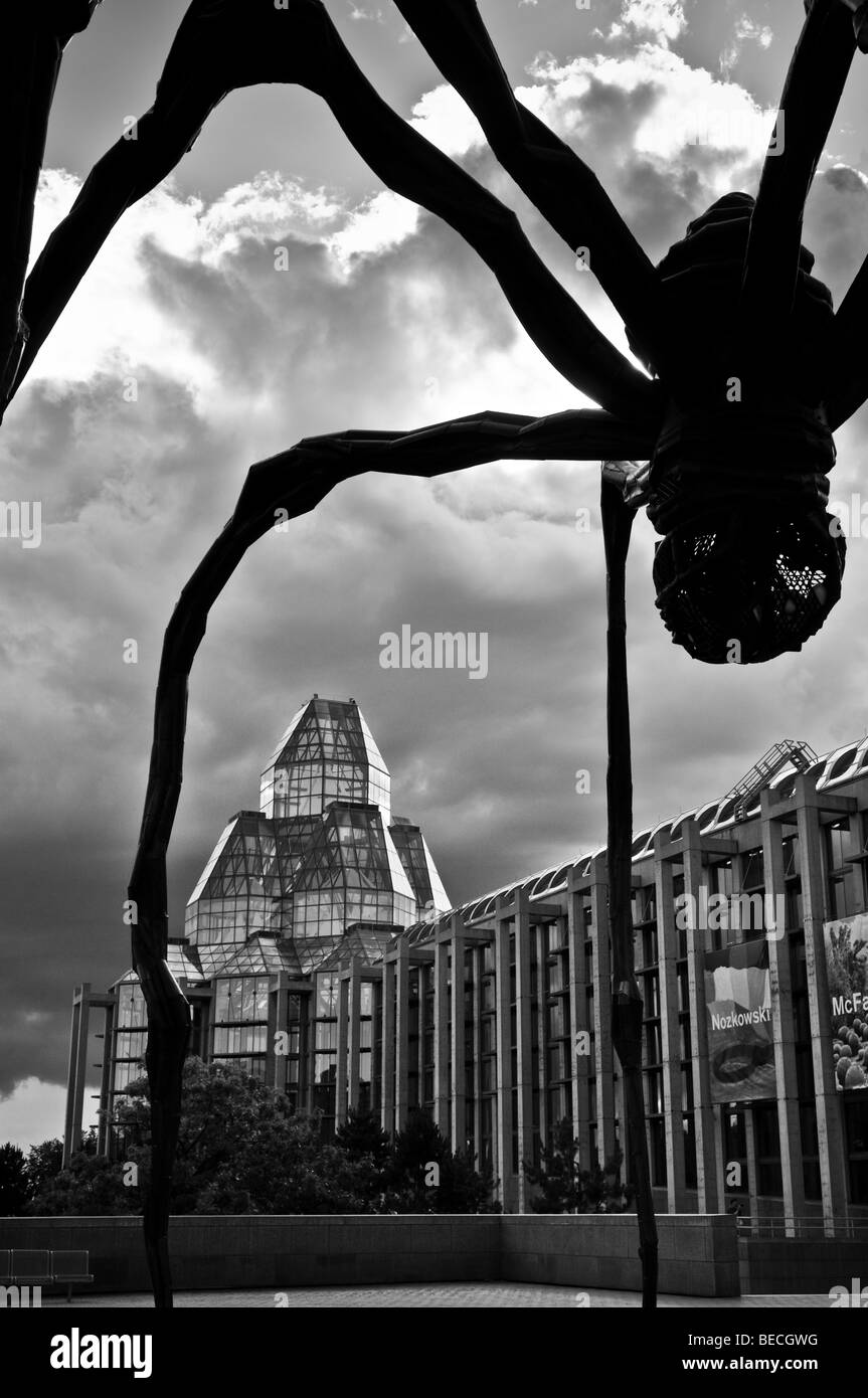 "Maman" a giant spider sculpture created by Louise Bourgeois dwarfs the National Art Gallery of Canada in Ottawa, Ontario. Stock Photo