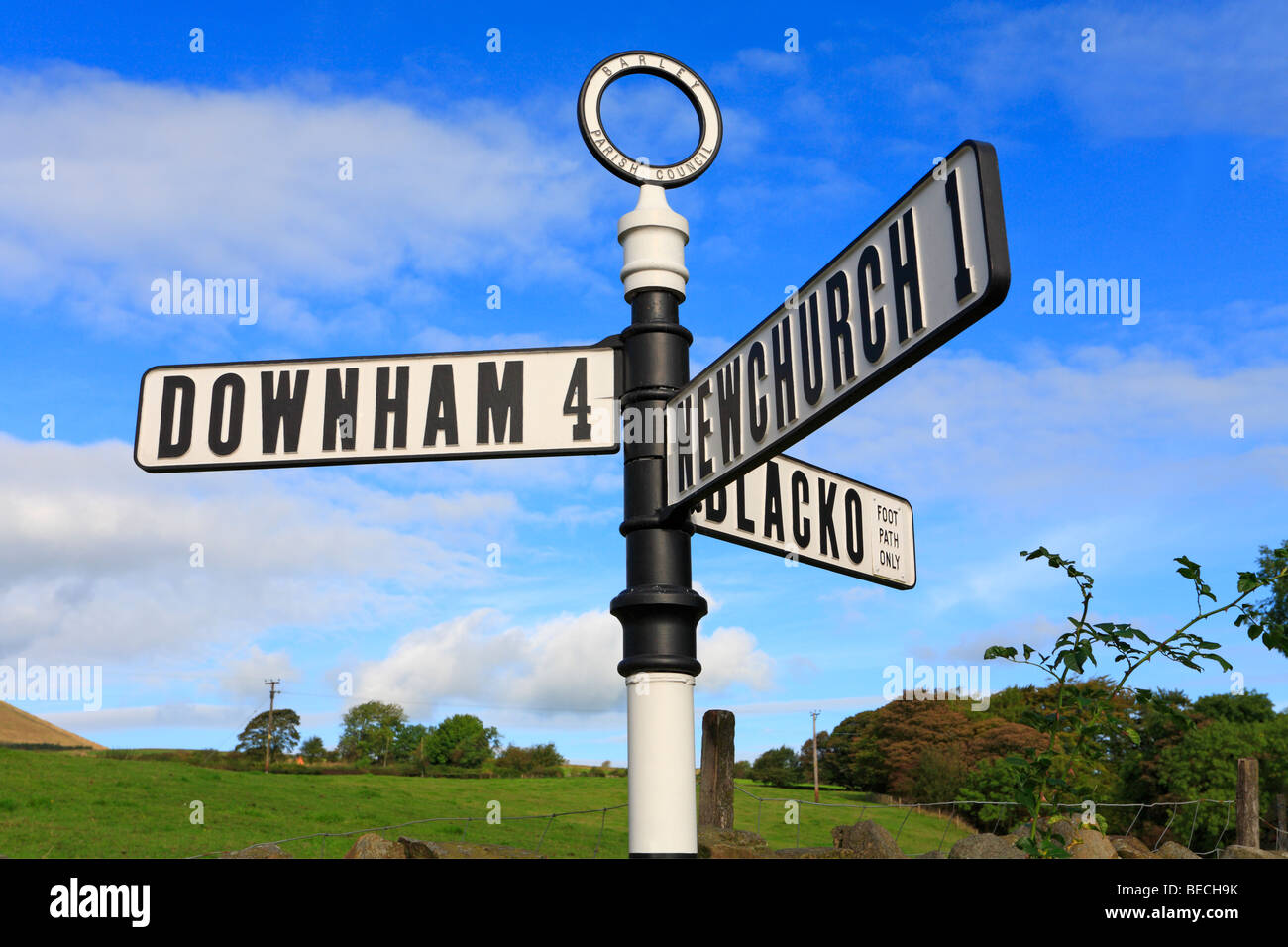 Black and white direction signpost to Downham, Newchurch and Blacko in Barley, Pendle, Lancashire, England, UK. Stock Photo