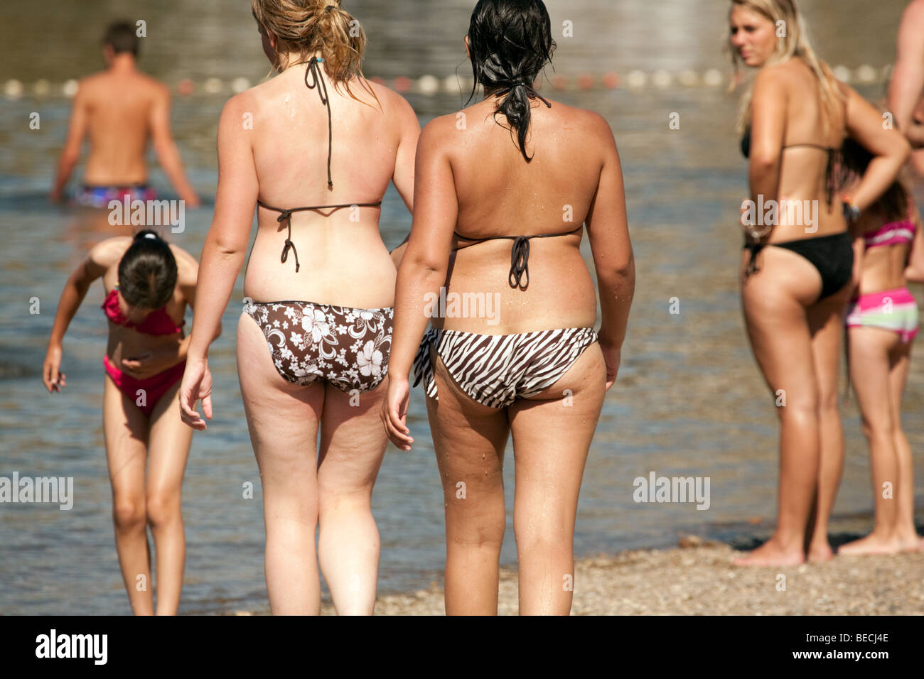 teenage girls in bikinis from the back, on the beach, Aquitaine France  Stock Photo - Alamy