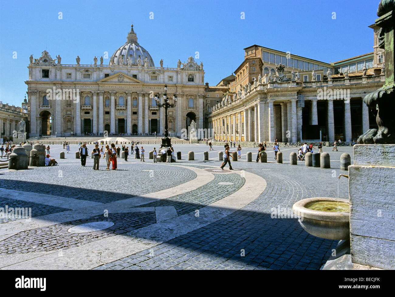 St. Peter's Basilica, Basilica di San Pietro, drinking water fountain, Saint Peter's Square, Piazza San Pietro, Vatican City, R Stock Photo
