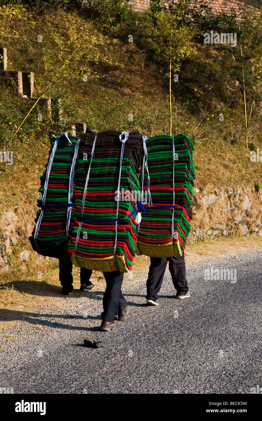 Nepalese Porters with Blankets Stock Photo Alamy