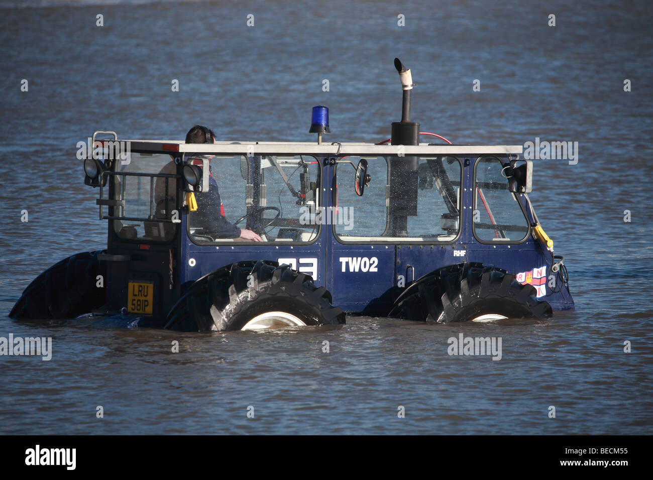 The Inshore Lifeboat beach recovery tractor unit at Lyme Regis. Stock Photo
