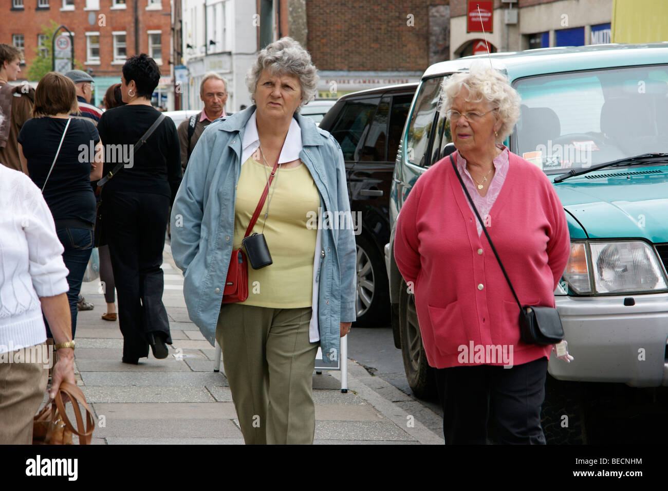 elderly women shopping in Chichester city centre Stock Photo