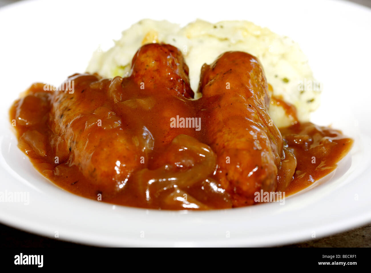 Lincolnshire Sausages With Cheddar And Bacon Mash Potatoes Bubble And Squeak And No People Stock Photo
