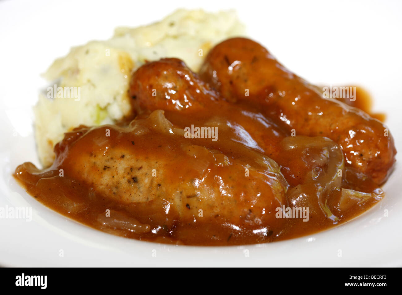 Lincolnshire Sausages With Cheddar And Bacon Mash Potatoes Bubble And Squeak And No People Stock Photo