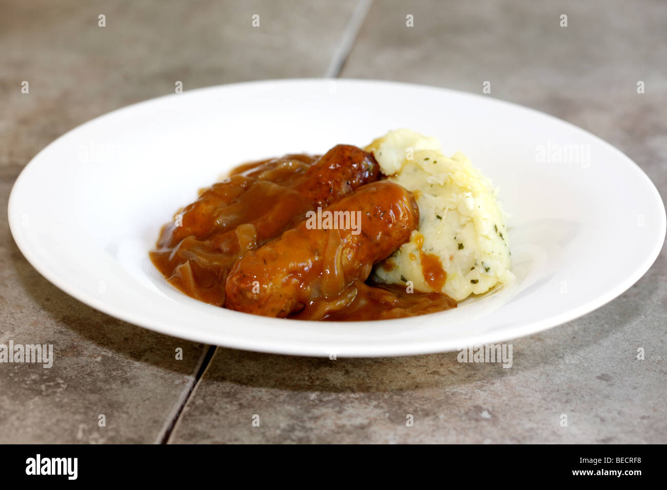 Lincolnshire Sausages With Cheddar And Bacon Mash Potatoes Bubble And Squeak And No People Stock Photo