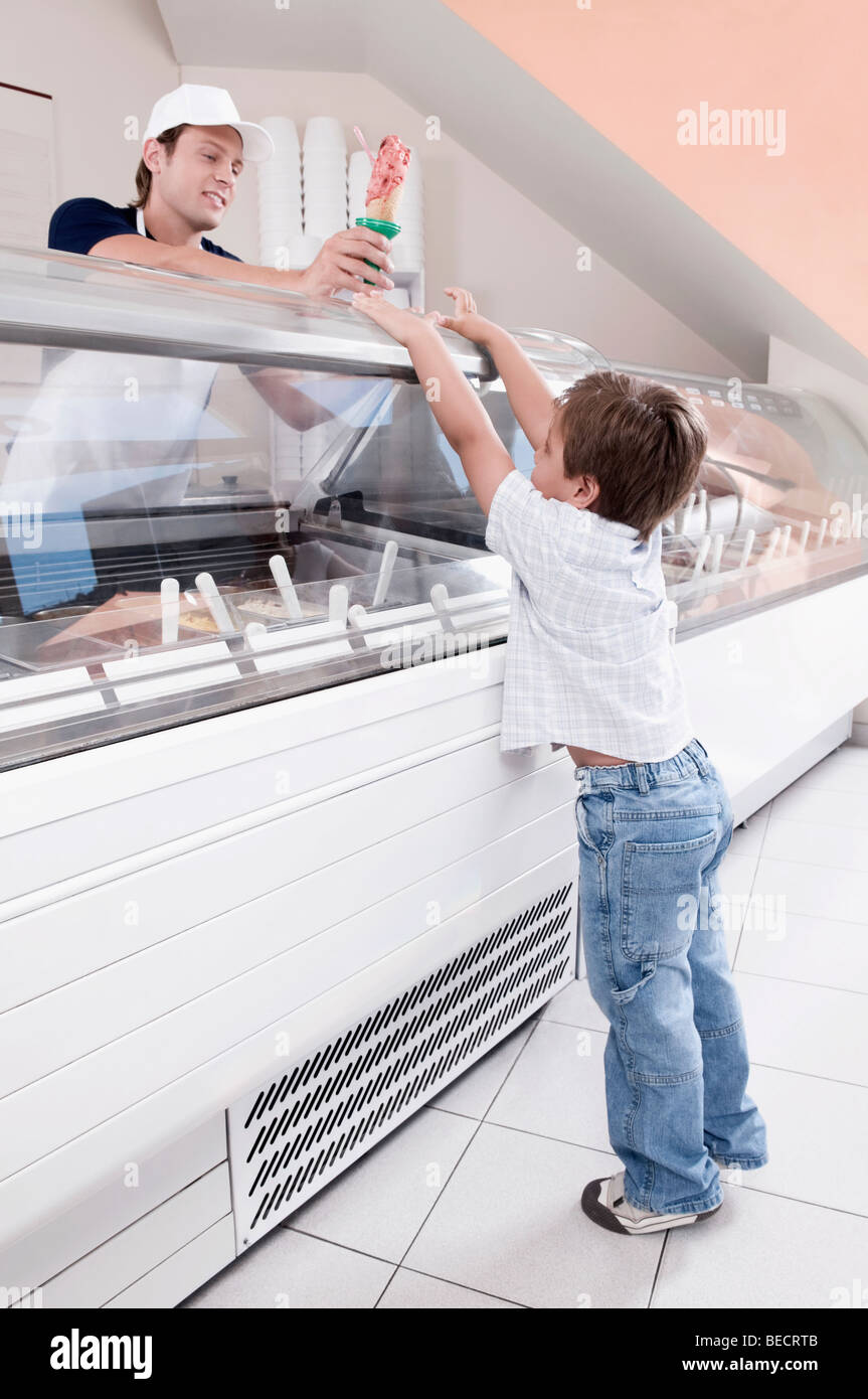 Boy ice cream cone glass hires stock photography and images Alamy