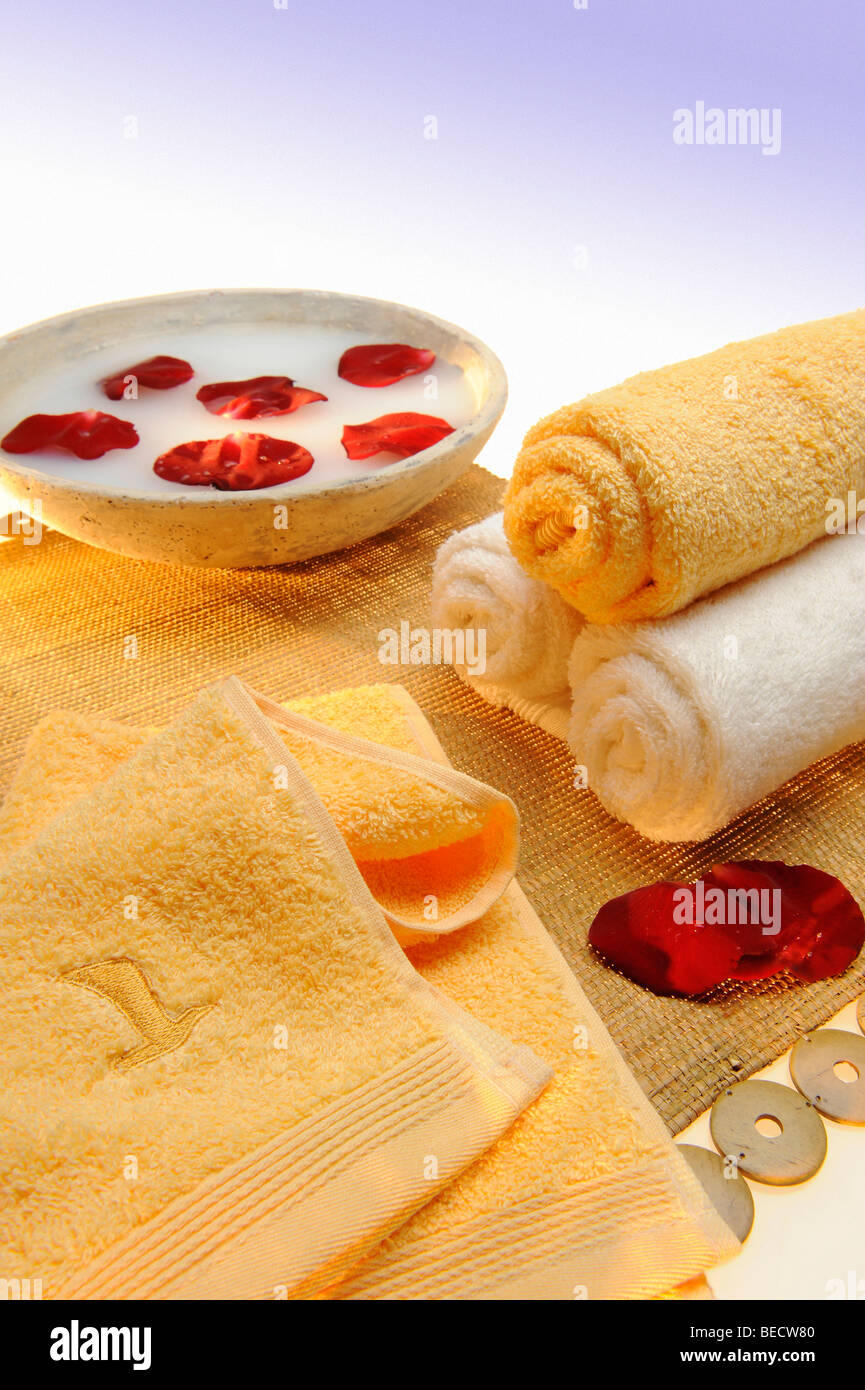 Rose petals and terry cloth towels, wellness Stock Photo