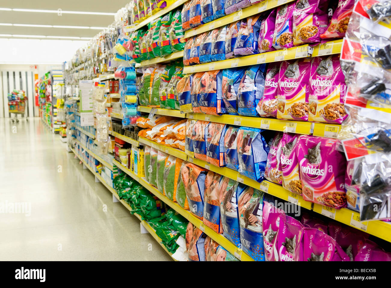 Packed food on shelves in a supermarket Stock Photo