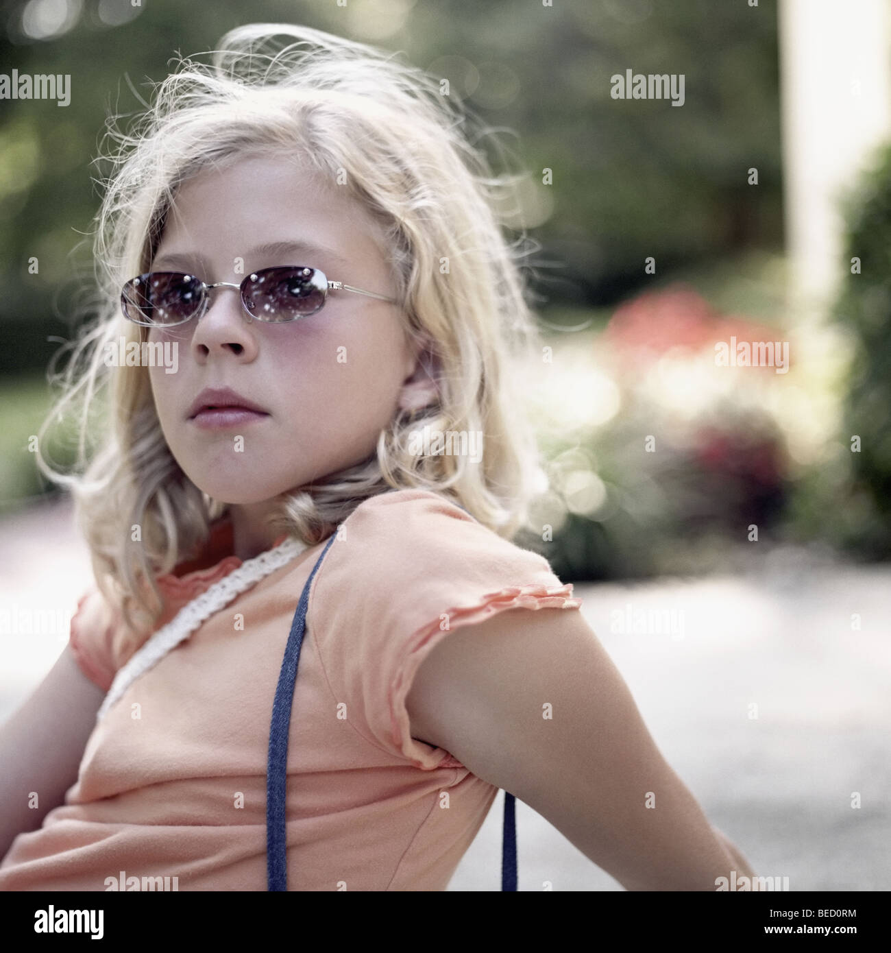 Portrait of a girl wearing sunglasses Stock Photo Alamy