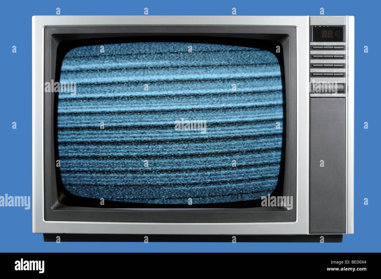 Vintage television isolated on a blue background Stock Photo