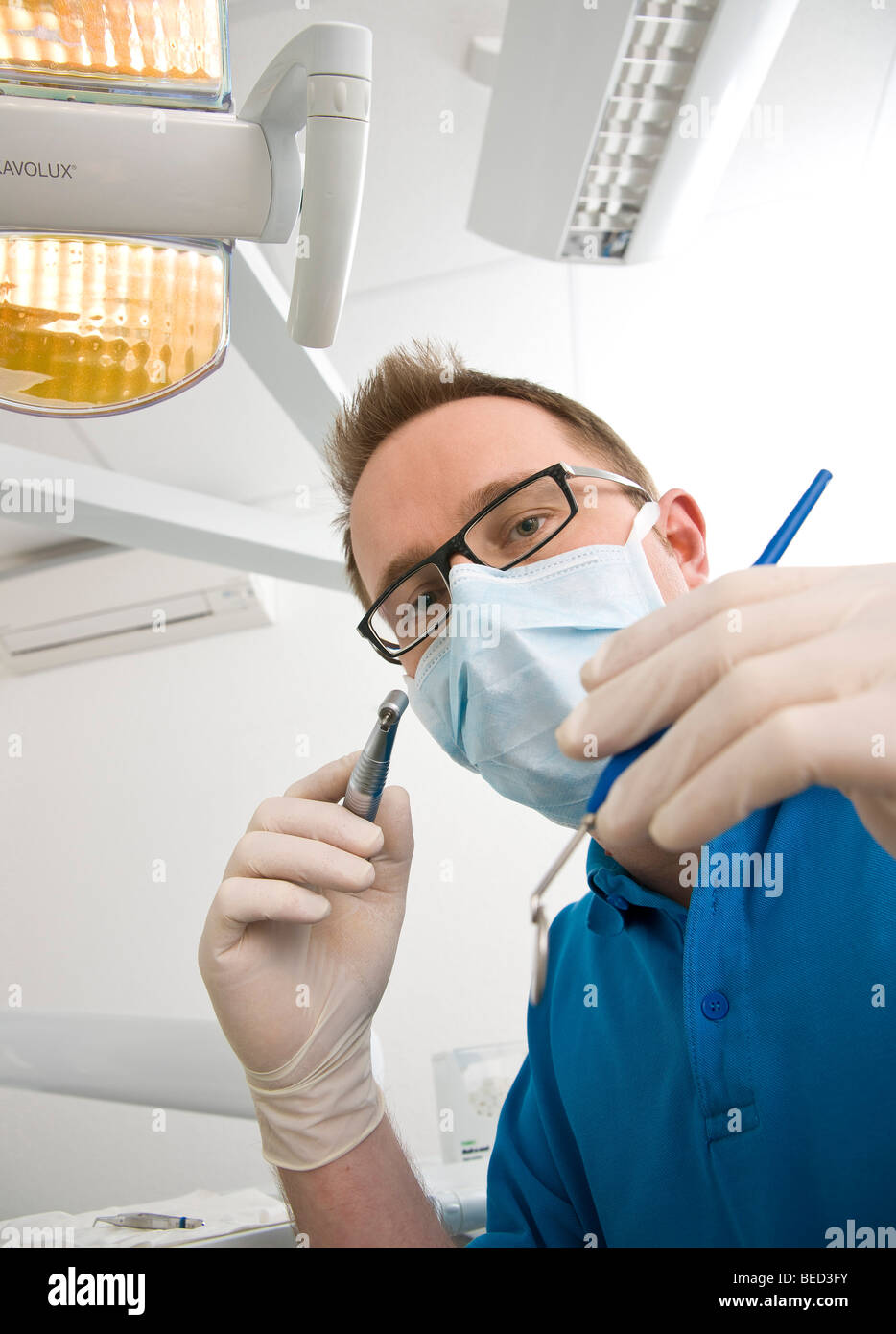 Dentist during treatment Stock Photo