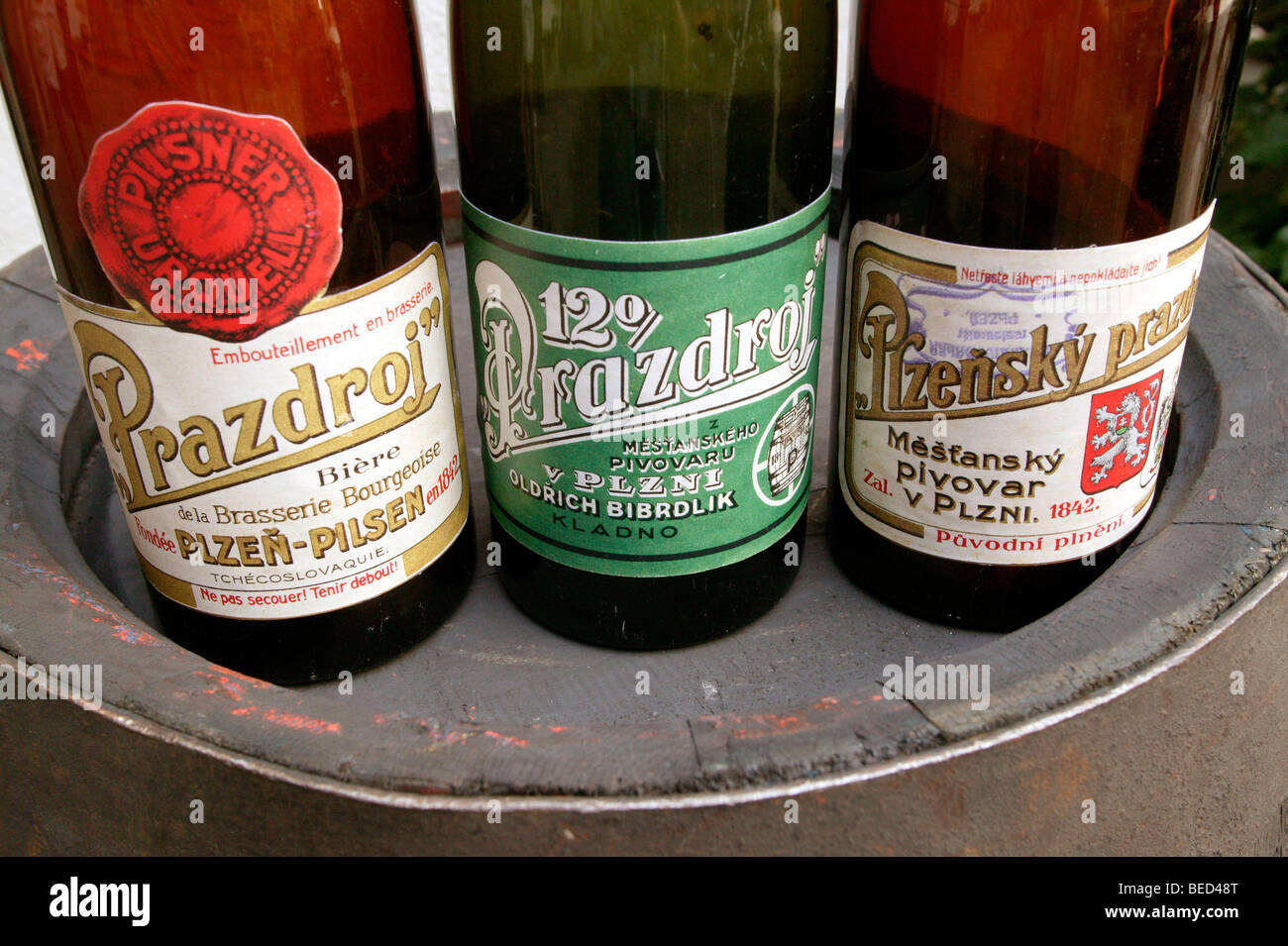 Old beer bottles of the Pilsner Brewery for the beer Pilsner Urquell, Pilsen, Plzen, Bohemia, Czech Republic, Europe. Stock Photo