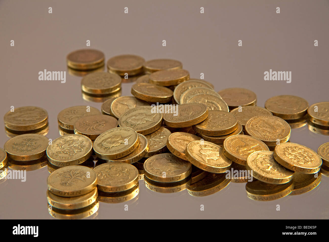 Pile coins hi-res stock photography and images - Alamy