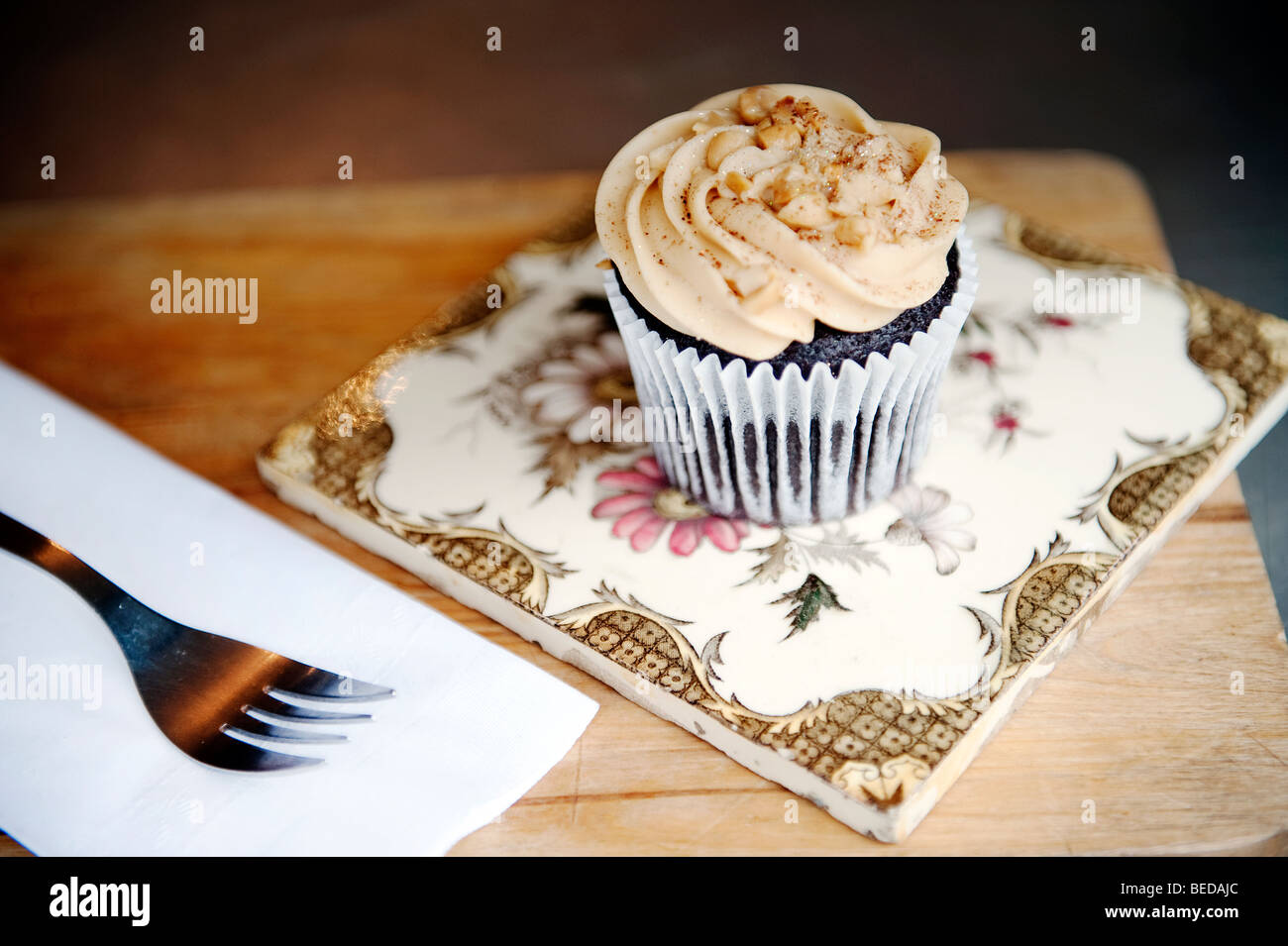 A peanut butter Cup cake and espresso coffee in Heart Buchanan deli and cafe on Byres Road in the West End of Glasgow, Scotland. Stock Photo