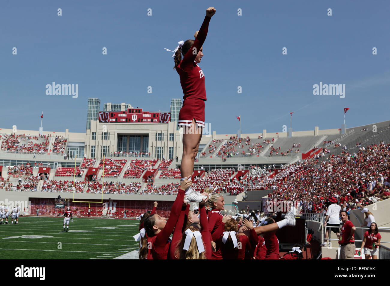 IU cheerleaders during an Indiana University football game. Stock Photo