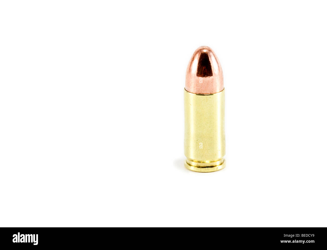 A single 9mm bullet isolated on white Stock Photo