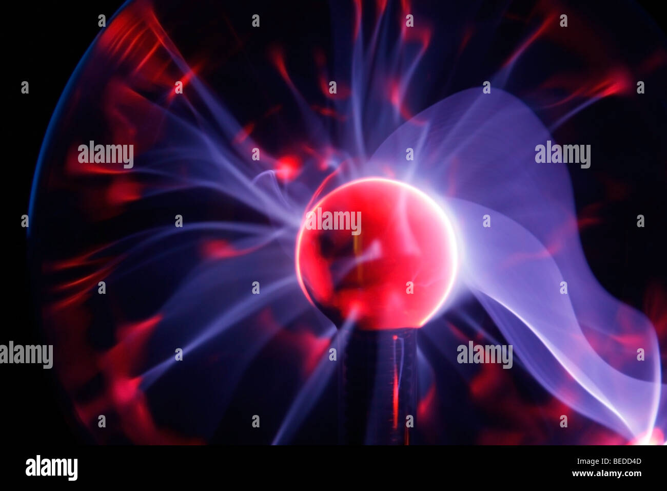 Electric plasma sphere showing flares of plasma Stock Photo