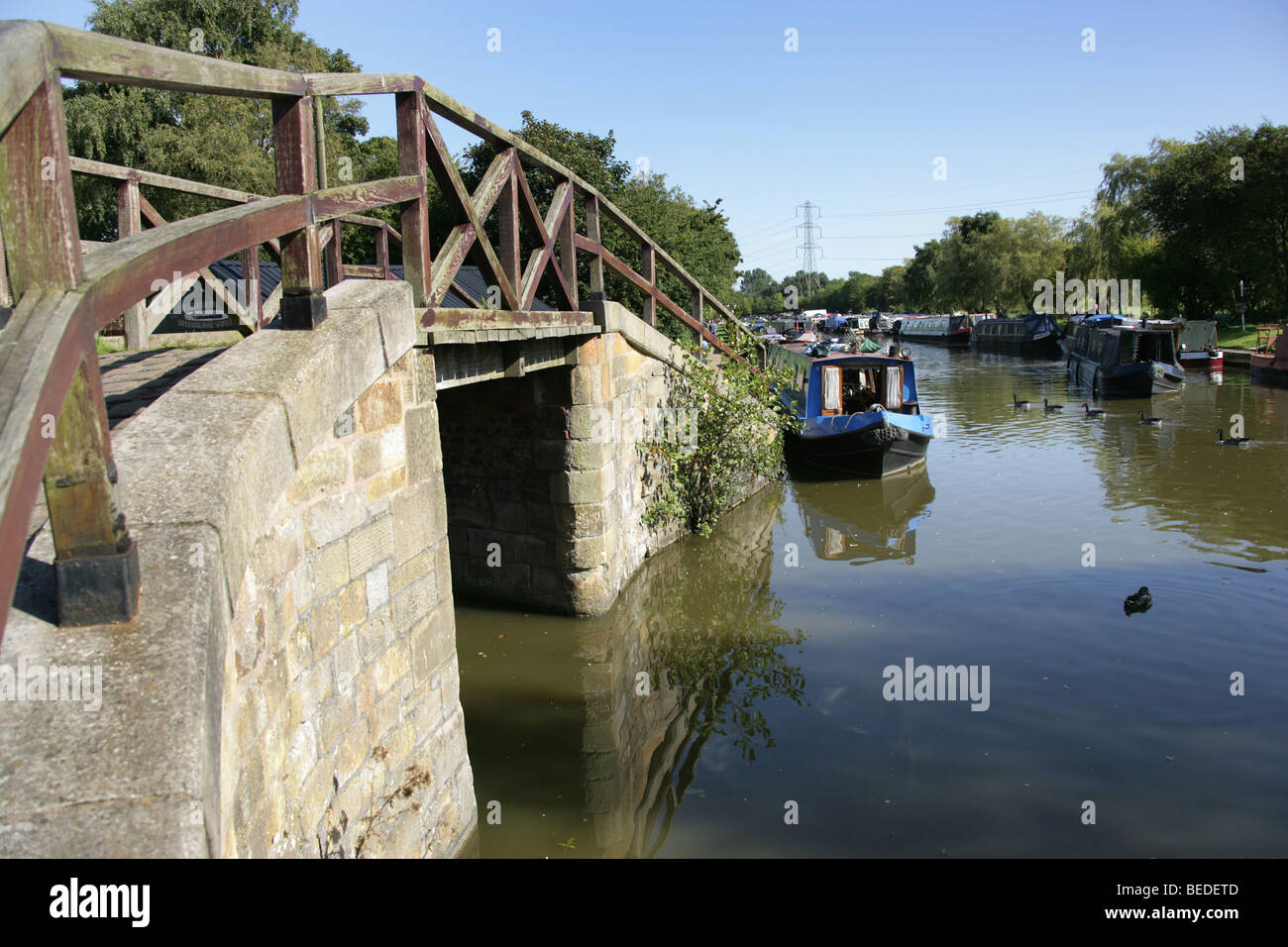 Village of Higher Poynton, England. Footbridge at Nelson Pit Marina in