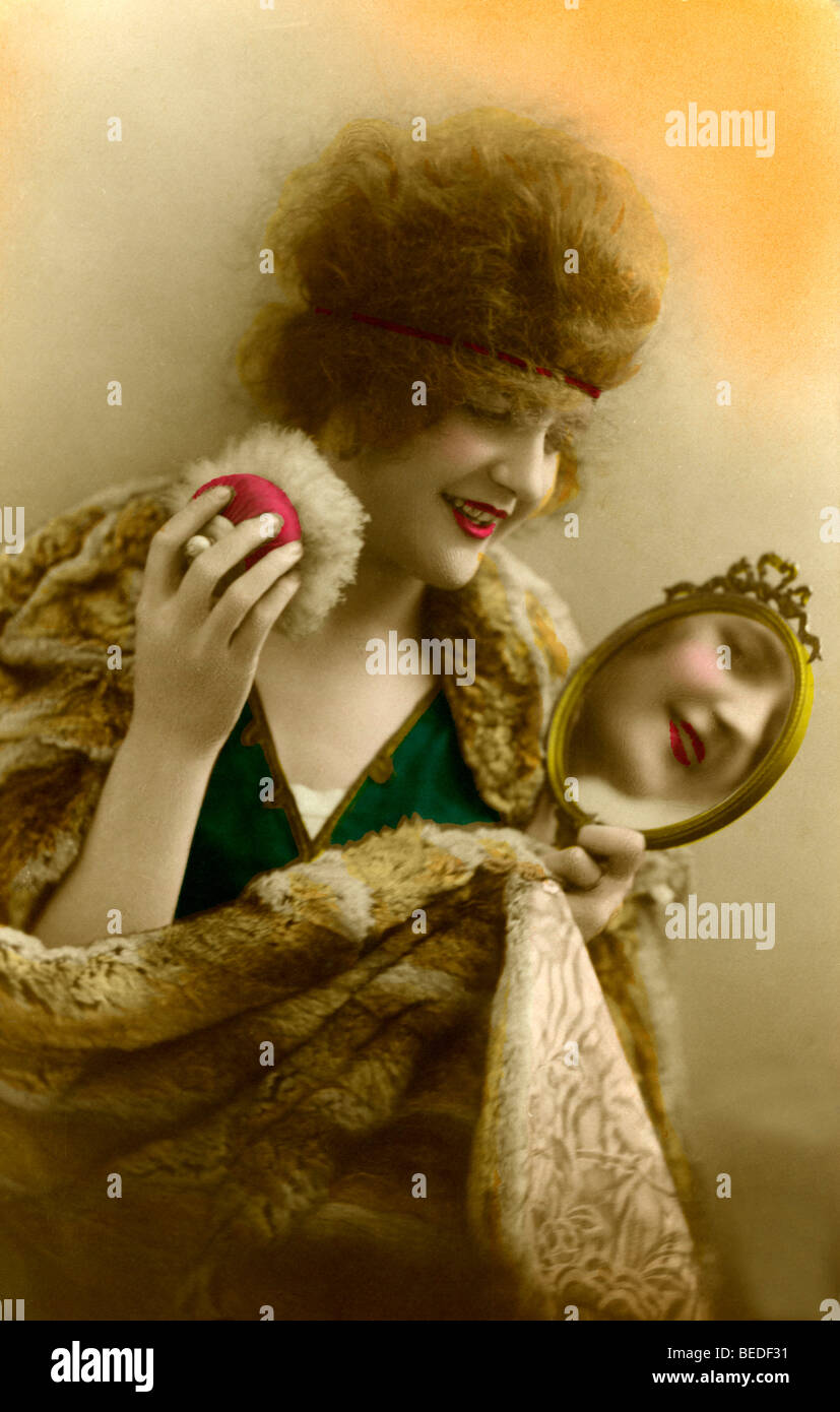 Historic photograph, fashion, woman holding a mirror, around 1920 Stock Photo