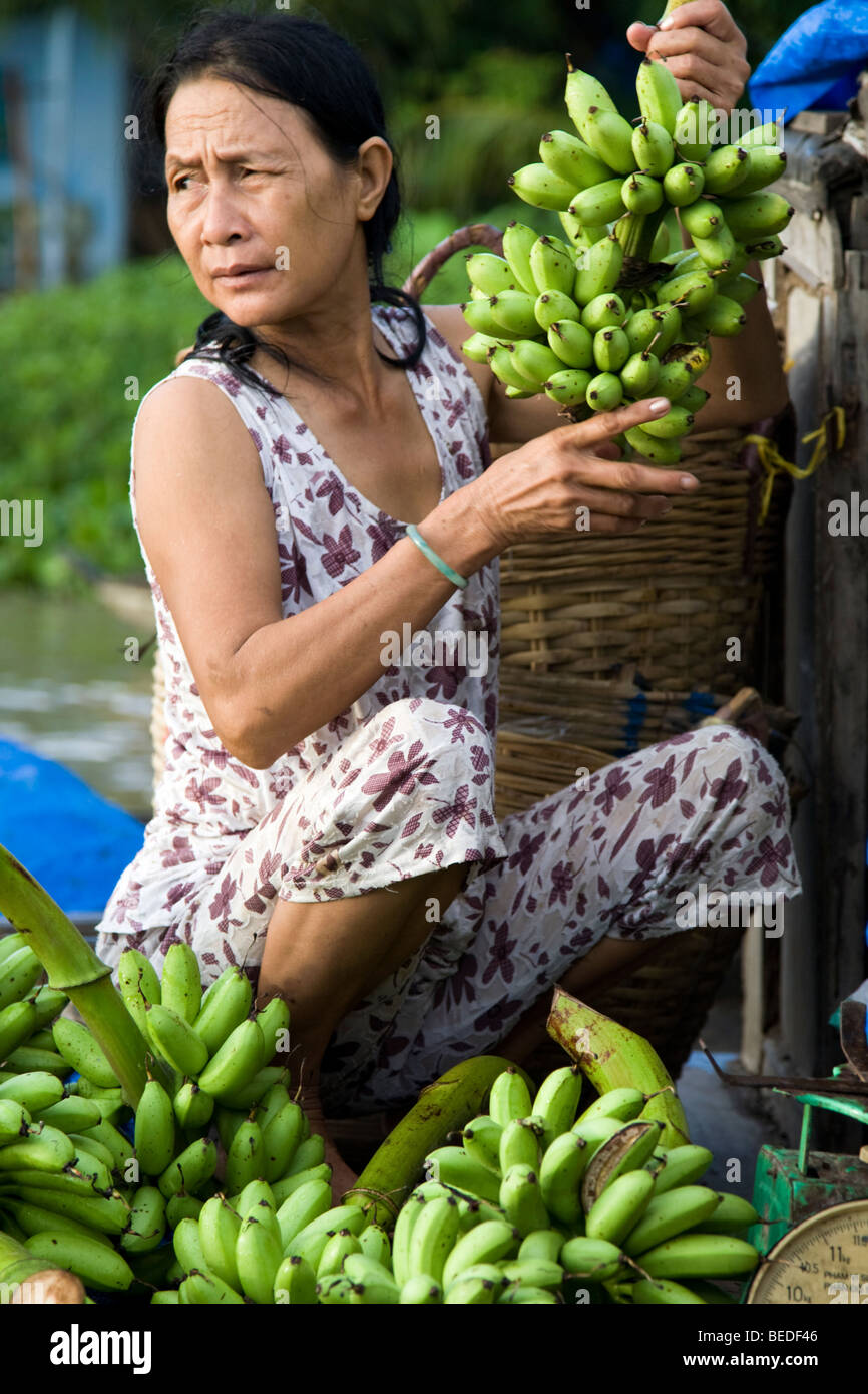 Banana Vendor at Phong Dien Floating Market, Mekong Delta Stock Photo