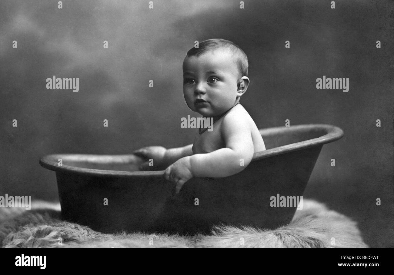 Historic photograph, baby in the bathtub, around 1915 Stock Photo