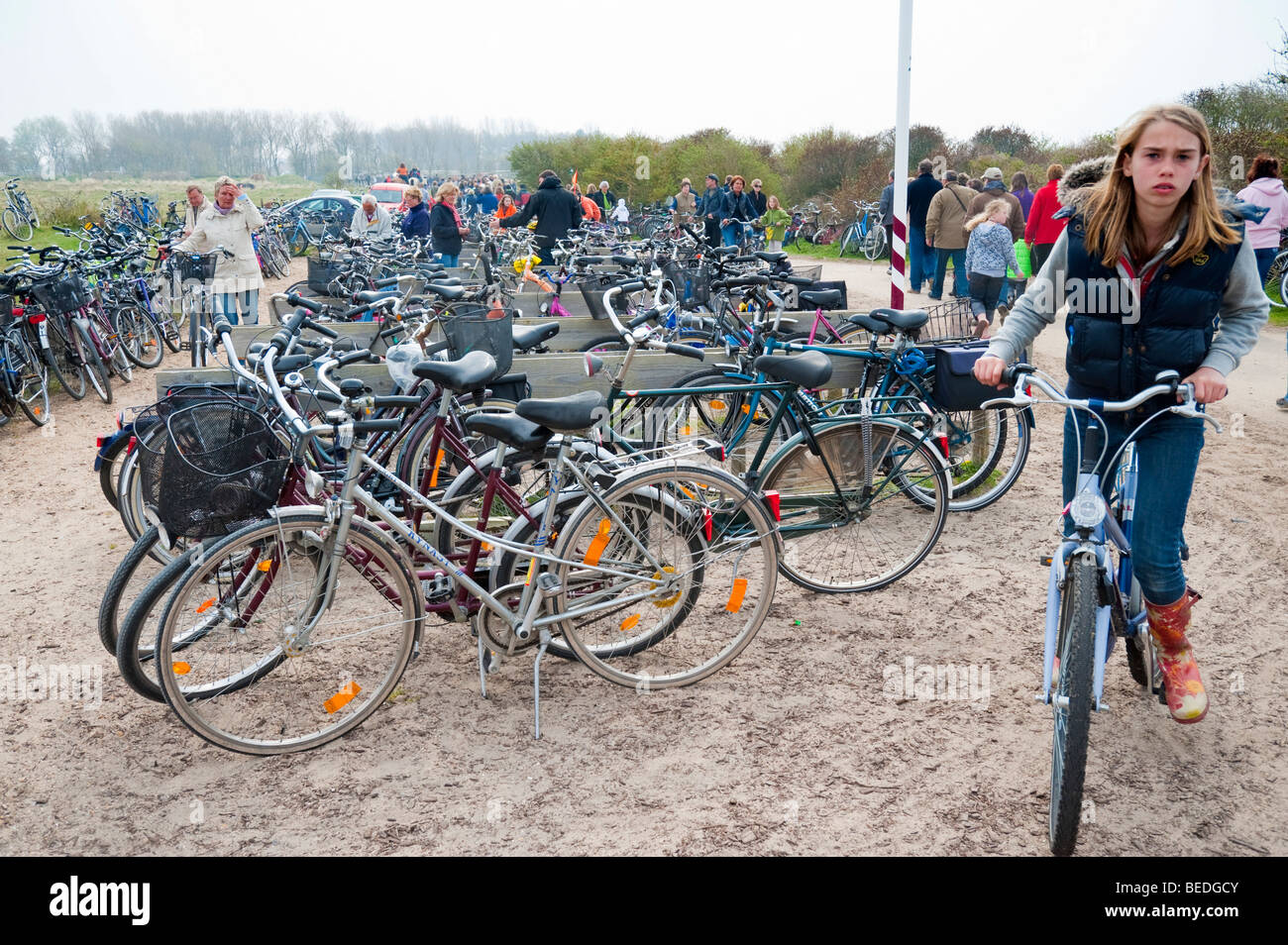 Bicycles stand close to the beach of the Dutch North Sea resort town of Renesse. Stock Photo