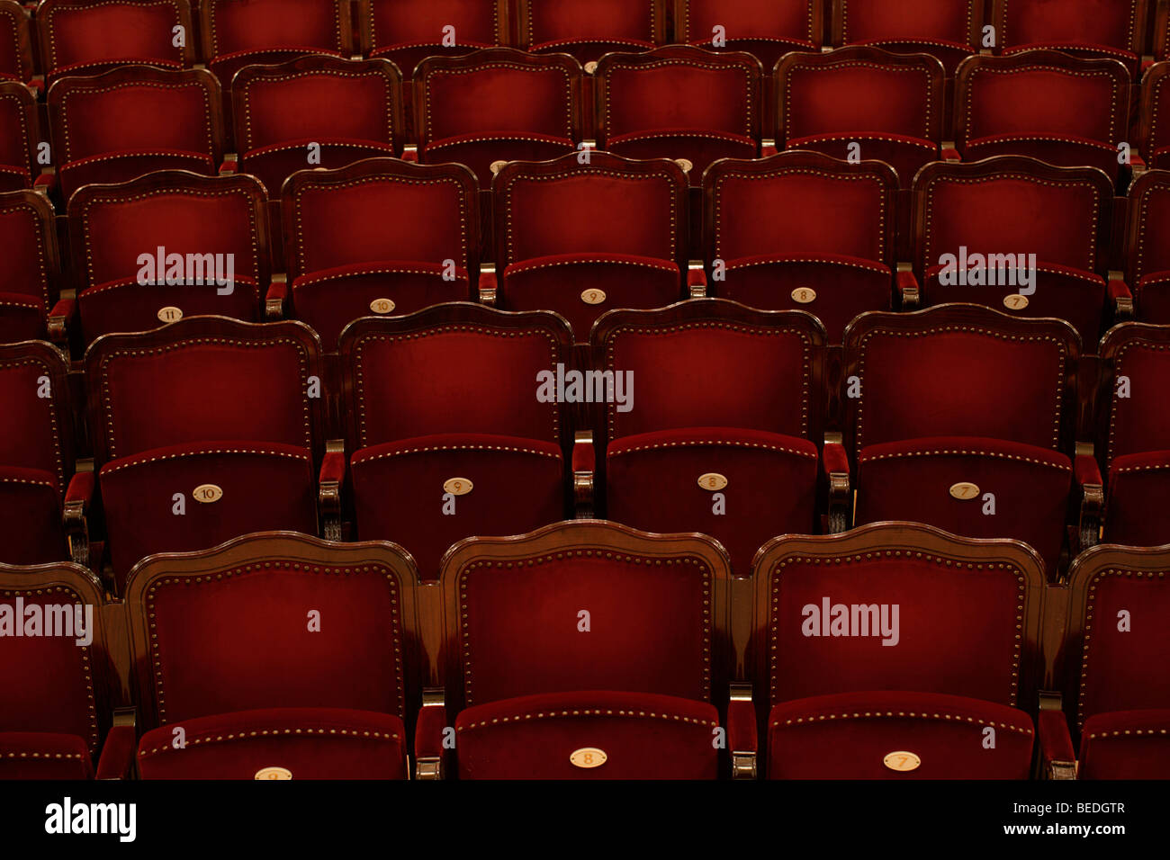 Rows of empty red theatre seats Stock Photo Alamy