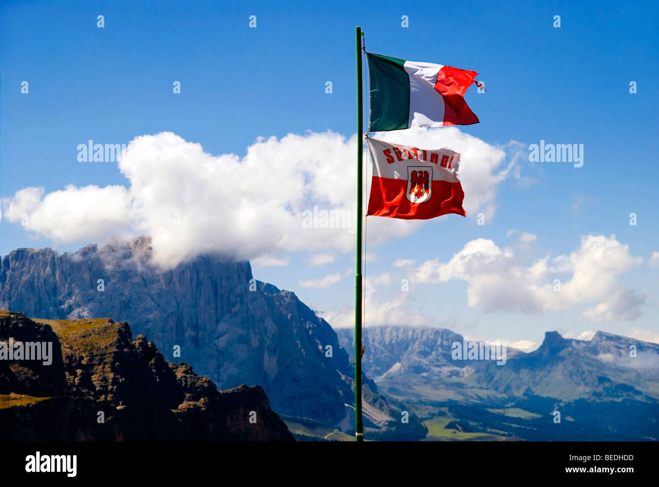 Italian and Tyrolean flag at the Puezhuette in Puez Geisler National Park, Sëlva, Selva, Val Gardena, Gardena Valley, Groednert Stock Photo