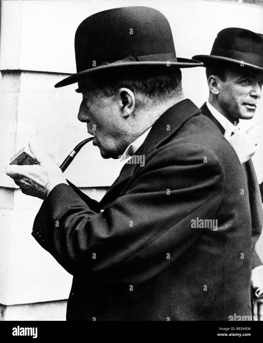 Stanley Baldwin smoking a pipe in London, England Stock Photo