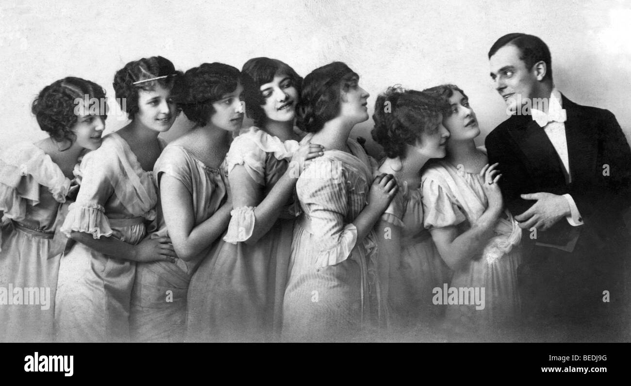 Historic photograph, playboy being adored by women, around 1910 Stock Photo