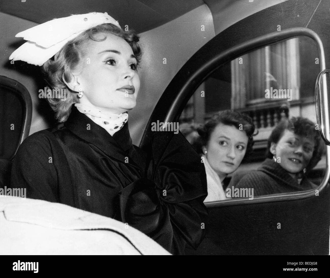 People the street through a window ZSA GABOR while she rides in a car Stock Photo - Alamy