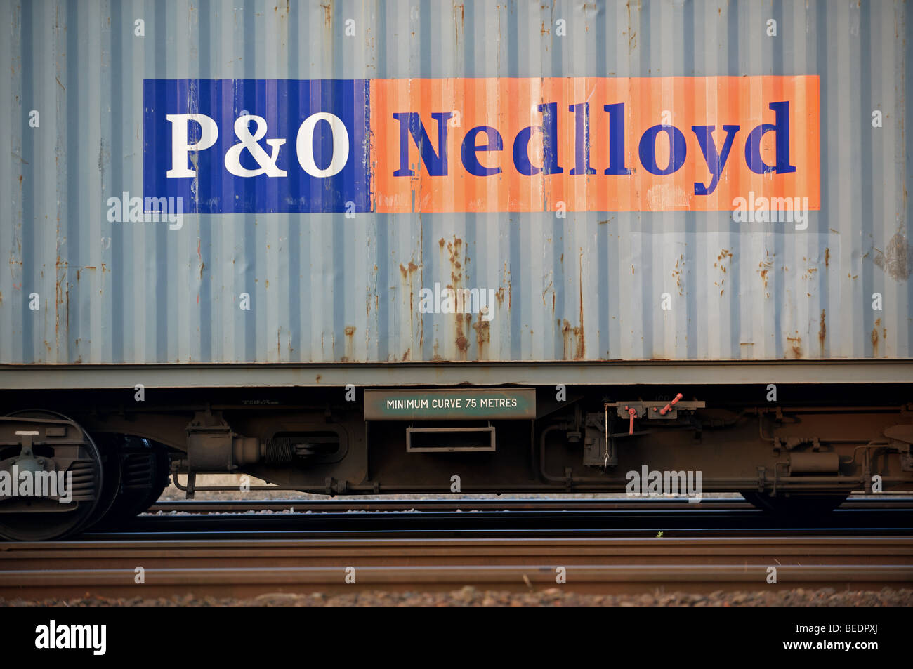 P&O Nedlloyd container onboard a freight train at the port of Felixstowe, Suffolk, UK. Stock Photo