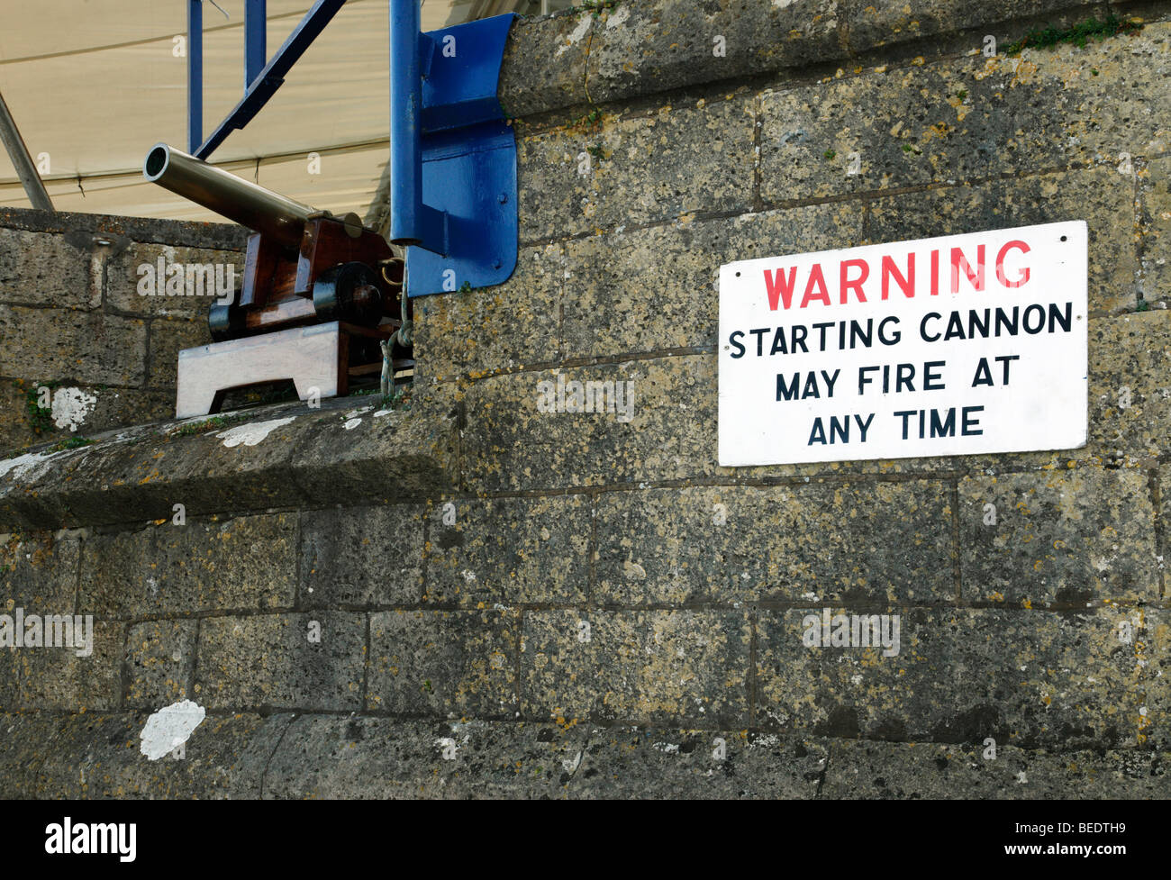 Warning notice for the Royal Yacht Squadron starting cannon. Cowes, Isle of Wight, England, UK. Stock Photo