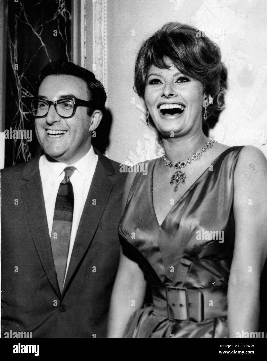 Sophia Loren and Peter Sellers at a reception for the film 'The Millionaires' Stock Photo
