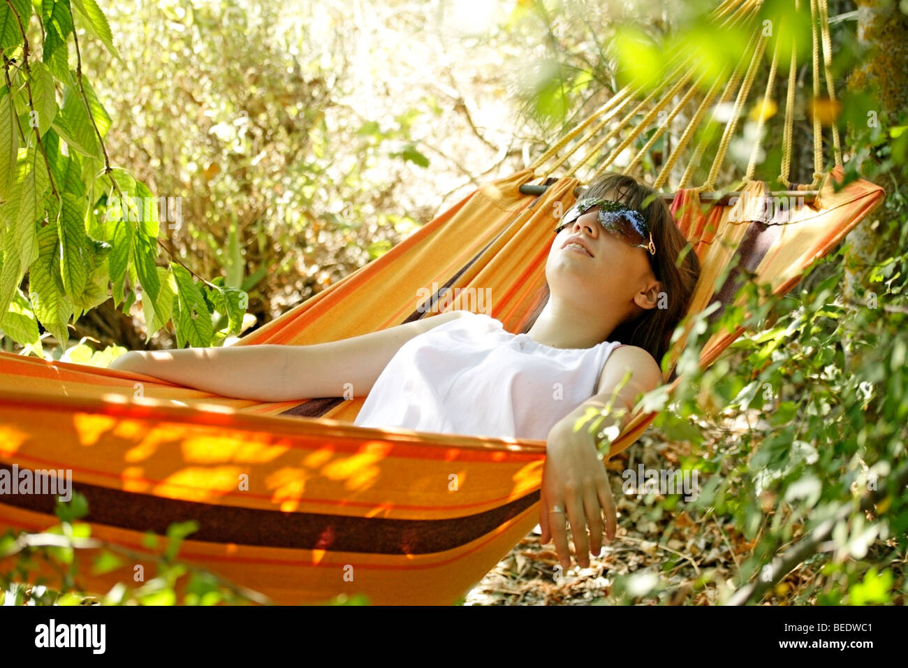 Sleeping in a hammock Stock Photo Alamy