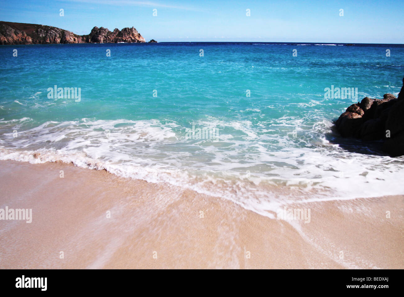sandy beach with blue sea Stock Photo