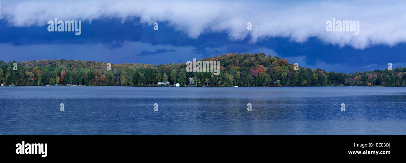 Storm clouds over the Lake of Bays at sunset. Stock Photo
