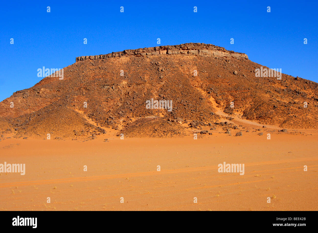 Heavily eroded rock hill in the Sahara, Libya, Africa Stock Photo