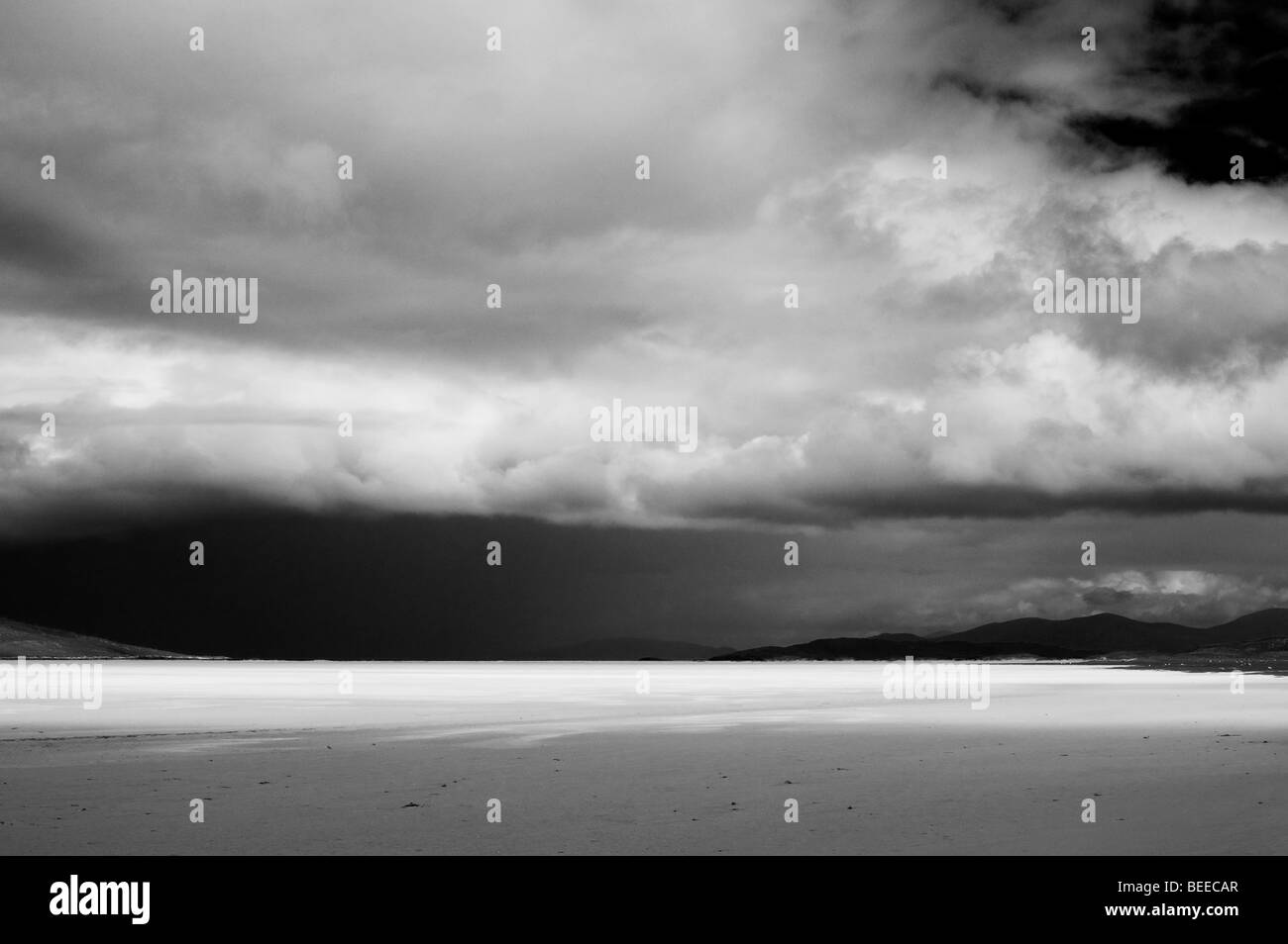 Rain storm and clouds over Traigh Scarista beach, Isle of Harris, Outer hebrides, Scotland. Black and White Stock Photo