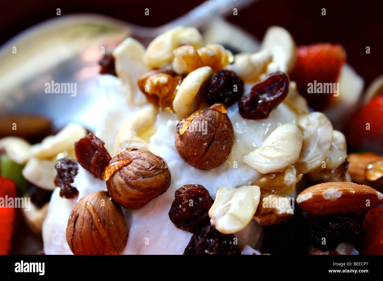 Healthy breakfast with yogurt nuts fruit and honey Stock Photo - Alamy