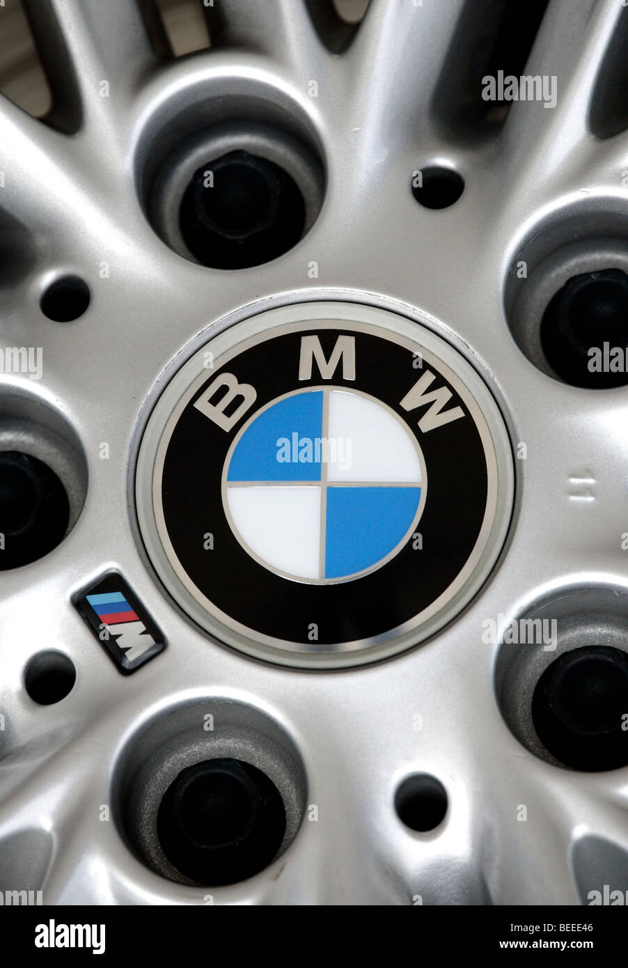 Aluminium wheel rim of a BMW 3 with company logo Stock Photo