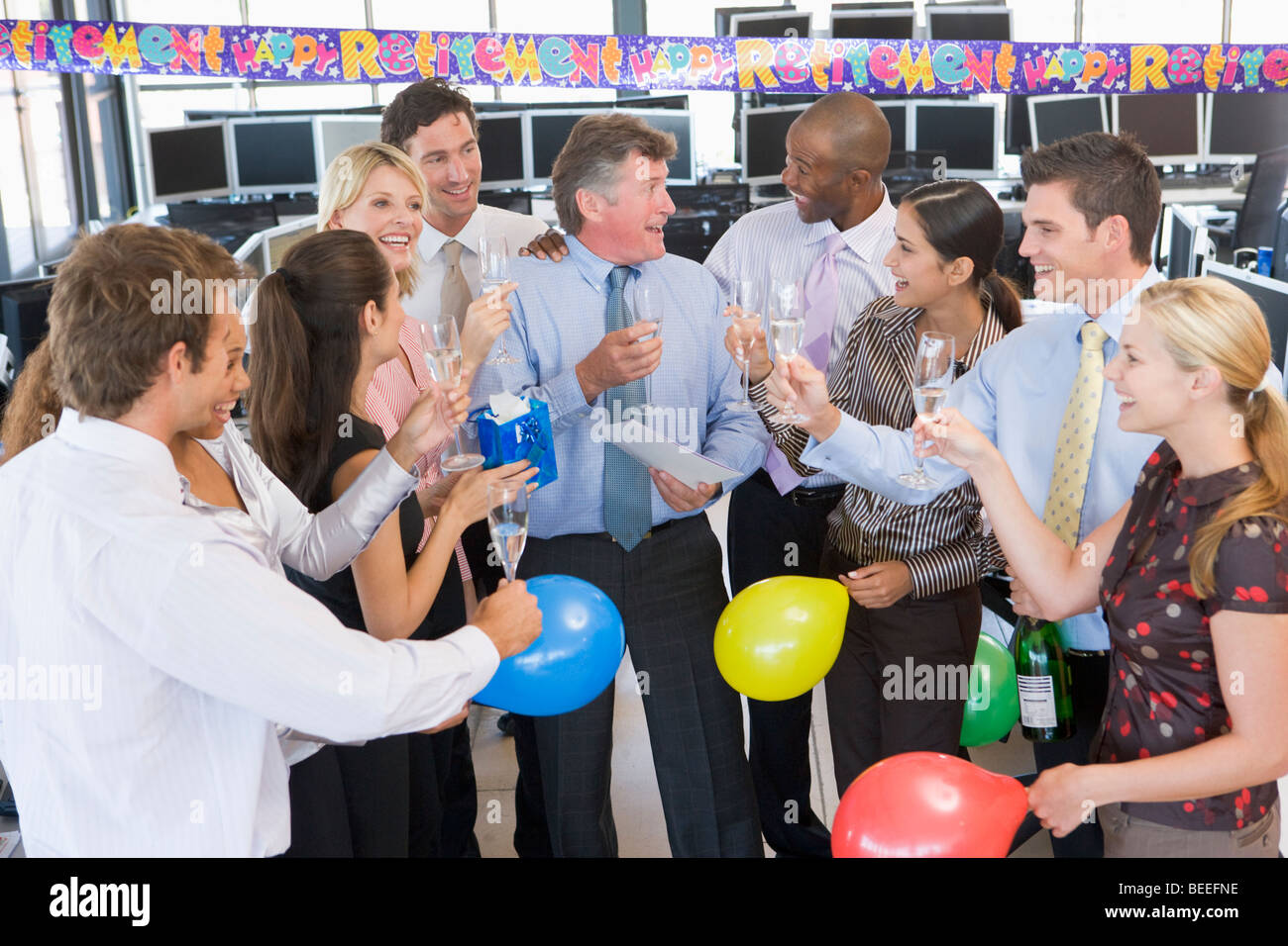 Stock Traders Celebrating In The Office Stock Photo