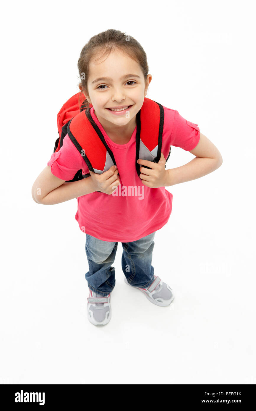 Studio Portrait of Smiling Girl Wearing School Bag Stock Photo Alamy