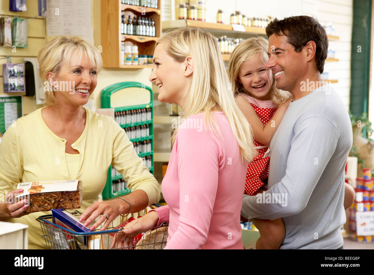 Female sales assistant in health food store Stock Photo