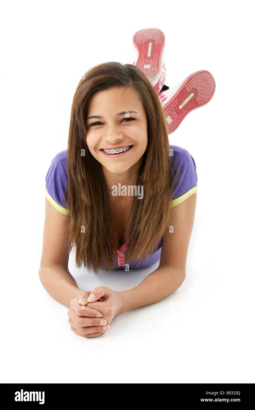 Teenage Girl Laying on Stomach Stock Photo